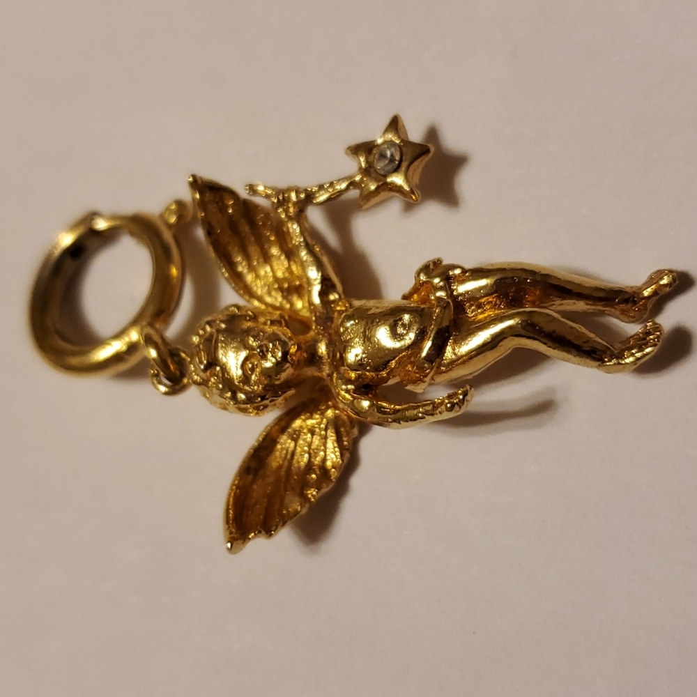 KIRK'S FOLLY Charm,goldtone, EUC 4" drop,stamped behind star,Pixie Collection